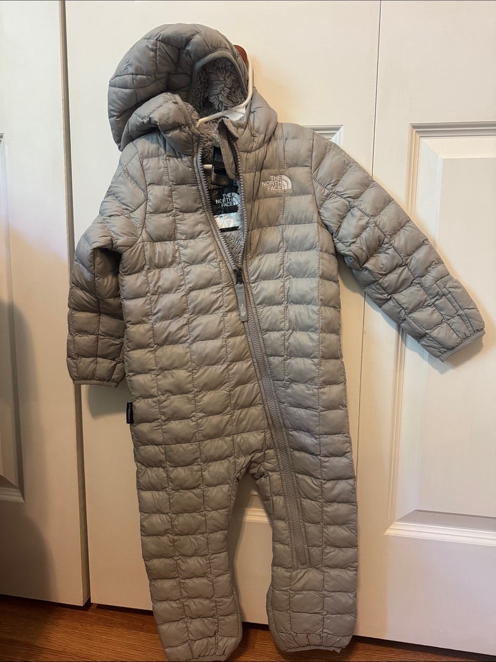 The North Face Light Gray Quilted Kids One-Piece Snowsuit with Hood
